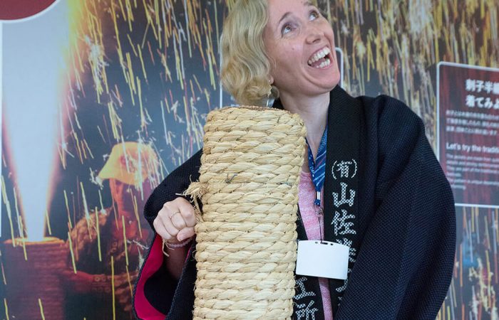 Elly Carrying a Big Handheld Firework