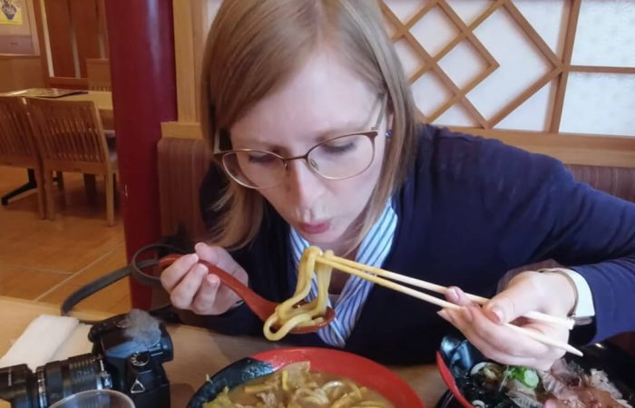 Lena eating Toyohashi Curry Udon