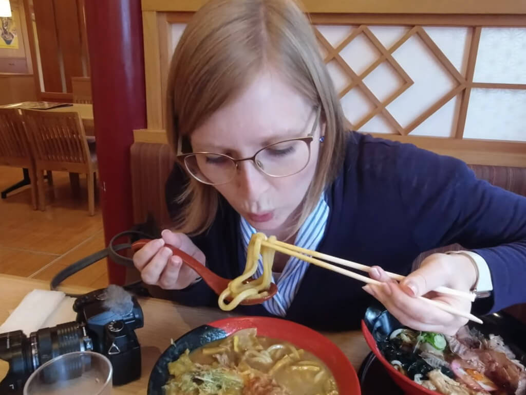Lena eating Toyohashi Curry Udon