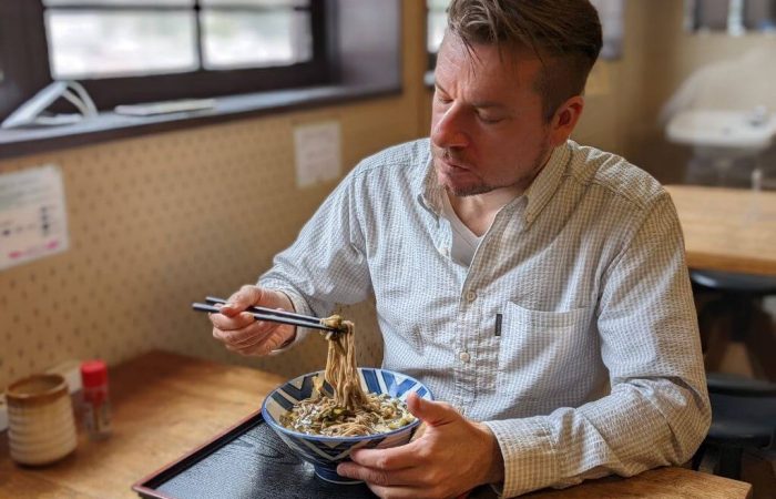 A Guest enjoying Sunki Soba Noodles