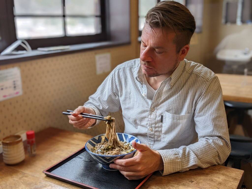 A Guest enjoying Sunki Soba Noodles