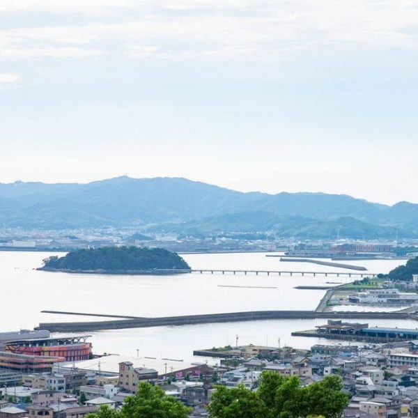 A view of Gamagori/Mikawa Bay from afar on a partly cloudy day.