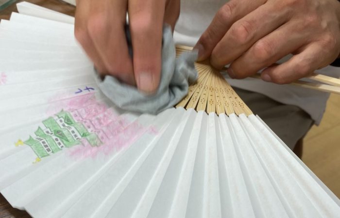 Finishing off a paper fan