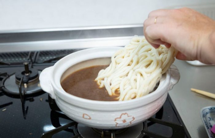 Adding Udon to Miso soup