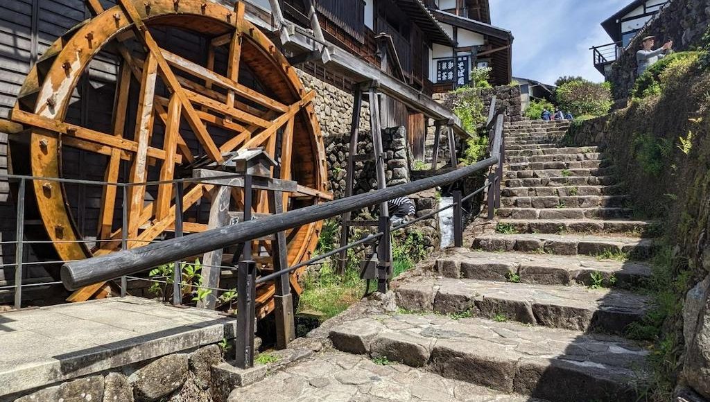 Magome-Tsumago A water wheel and steps on the Nakasendo.
