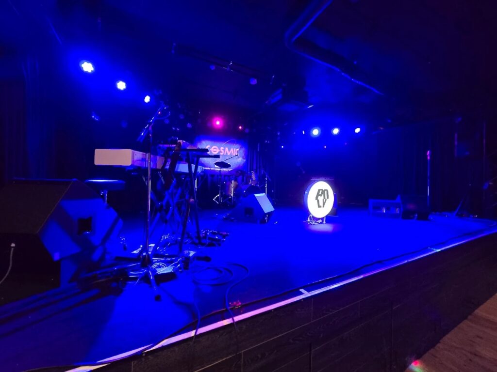 The empty, blue-lit stage at Nagoya Jammin'.
