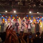 Six performers salute the crowd at Club Quattro.