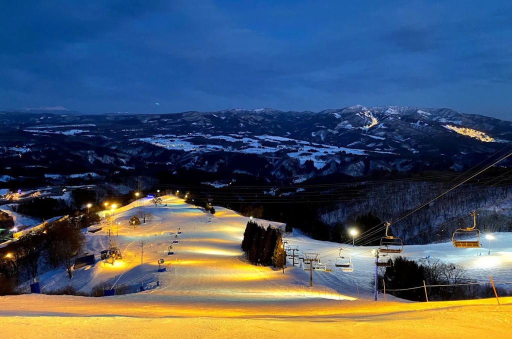 Dynaland Ski Resort lit up at night.