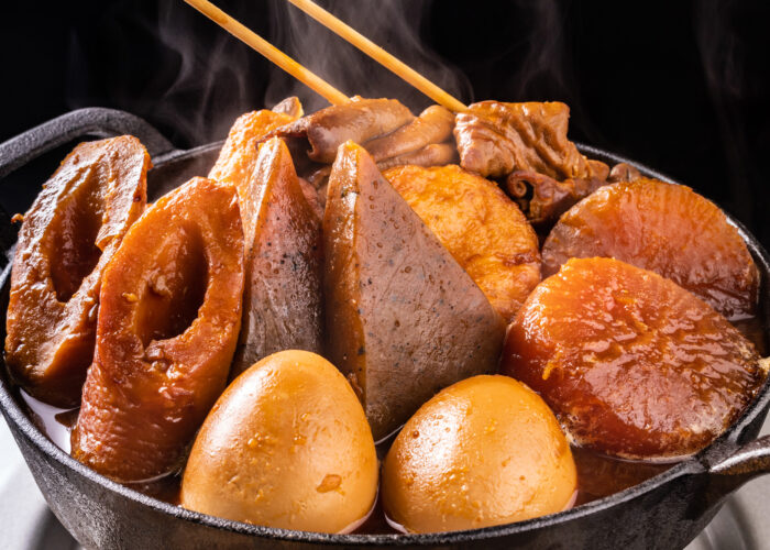 A steaming hotpot of miso oden with konnyaku, fish, eggs, daikon, and more.